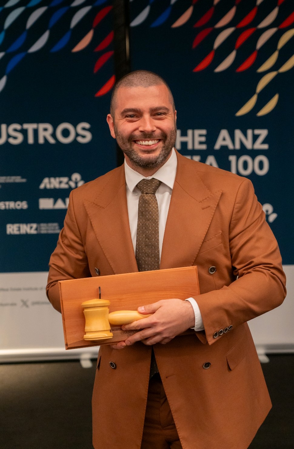 Luke Banitsiotis crowned Australasia's top auctioneer at AUSTROS 2024